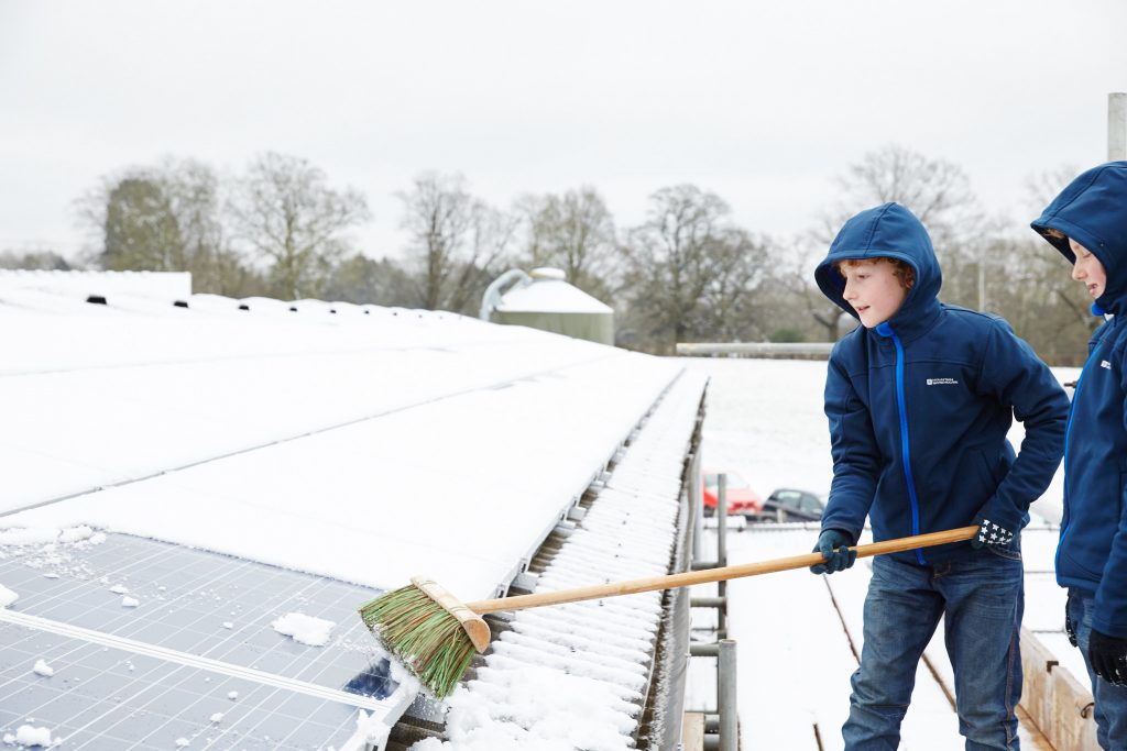 solar panels in the snow