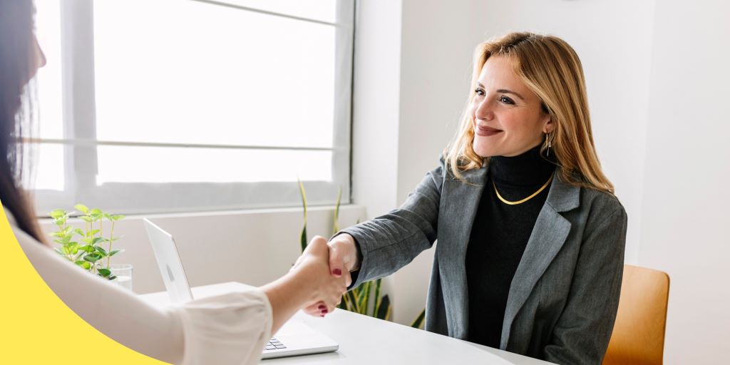 Professional preparing for an interview with documents, resume, and personal essentials