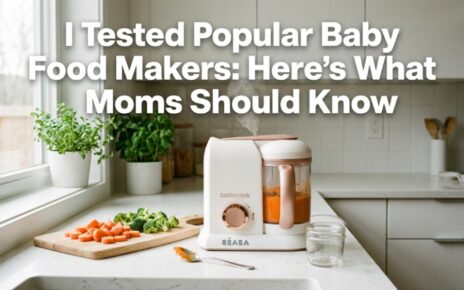 Modern baby food makers steaming and blending fresh organic vegetables on a kitchen counter.