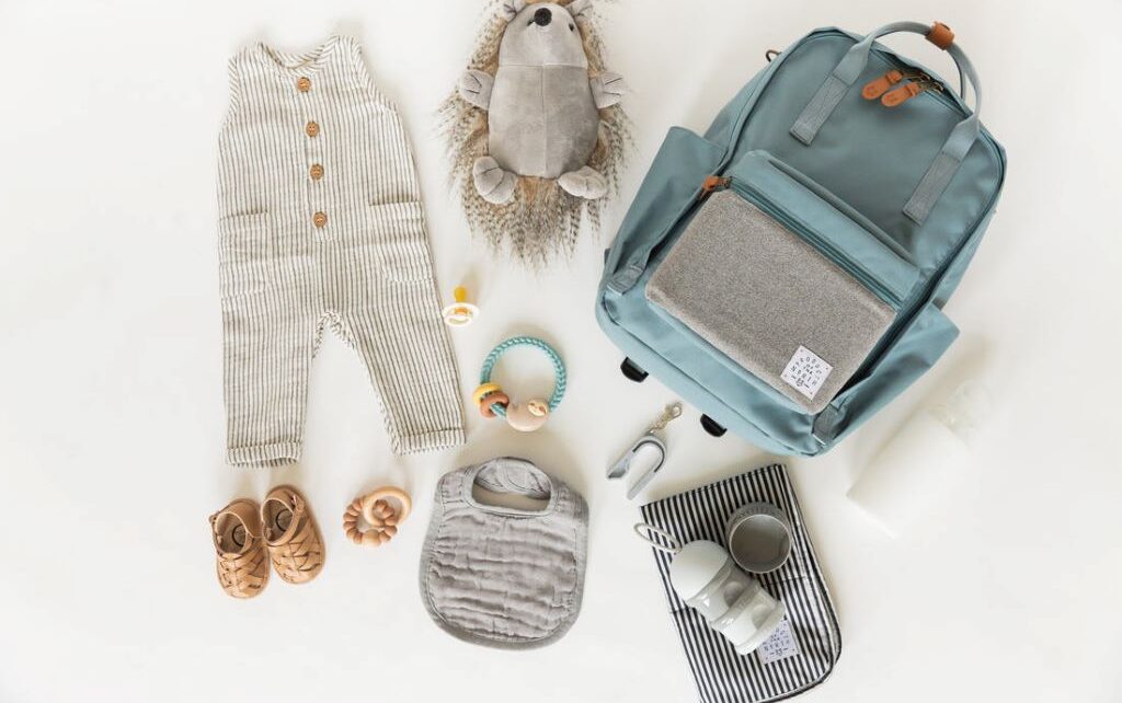 Budget-friendly baby essentials including stroller, bottles, and diaper bag