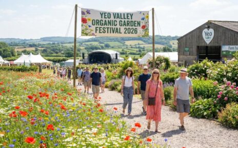 Visitors walking through the six-and-a-half acres of organic-certified Yeo Valley garden in Blagdon, Somerset, surrounded by wildflower meadows and lush borders during the 2026 festival